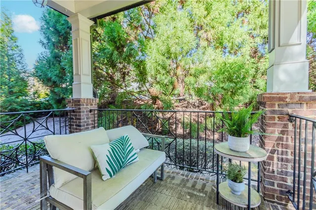 a view of swimming pool with outdoor seating and yard