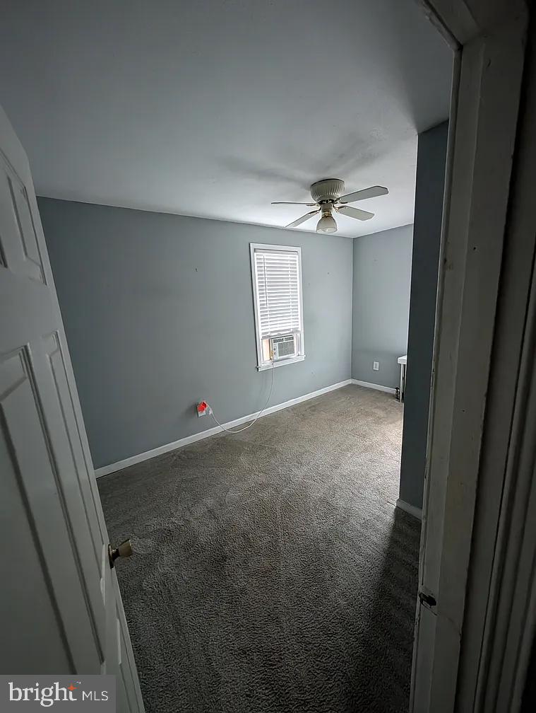 1226 Haycreek Road Birdsboro, PA 19508 - Photo 6 of 16 a view of a livingroom with a ceiling fan and window