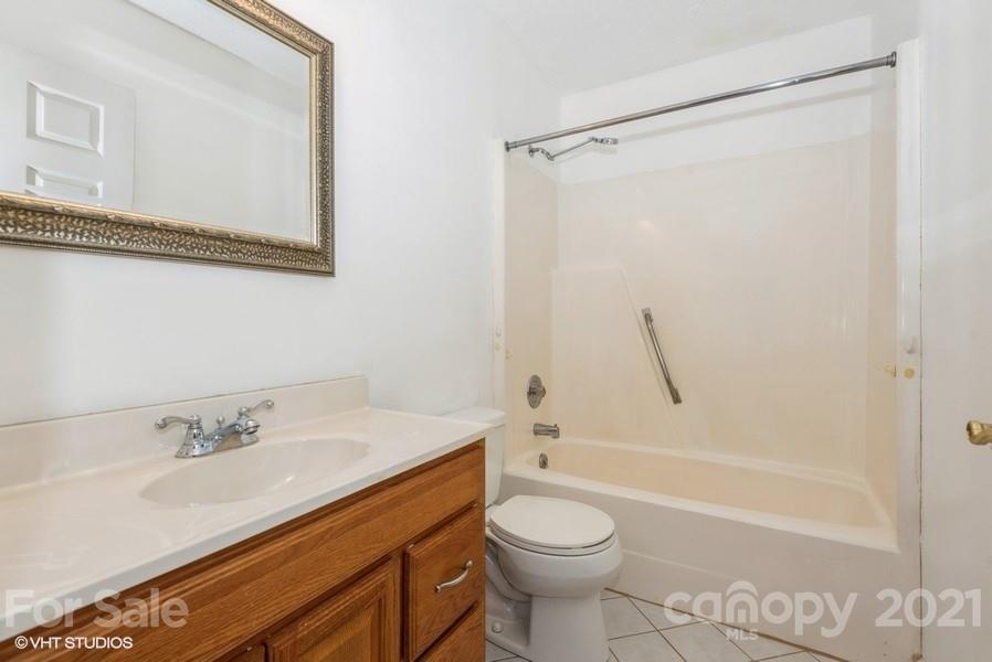 2564 Stroupe Road Clover, SC 29710 - Photo 23 of 29 a bathroom with a sink a toilet and a bathtub