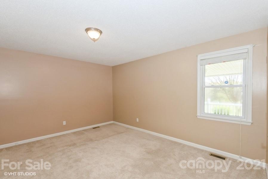 2564 Stroupe Road Clover, SC 29710 - Photo 26 of 29 an empty room with windows