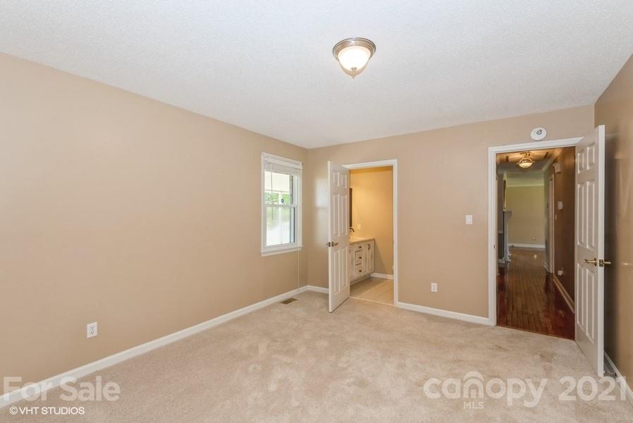 2564 Stroupe Road Clover, SC 29710 - Photo 27 of 29 an empty room with windows and closet