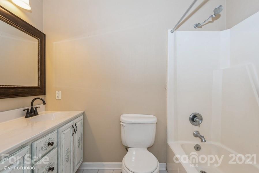 2564 Stroupe Road Clover, SC 29710 - Photo 28 of 29 a bathroom with a sink a toilet and shower