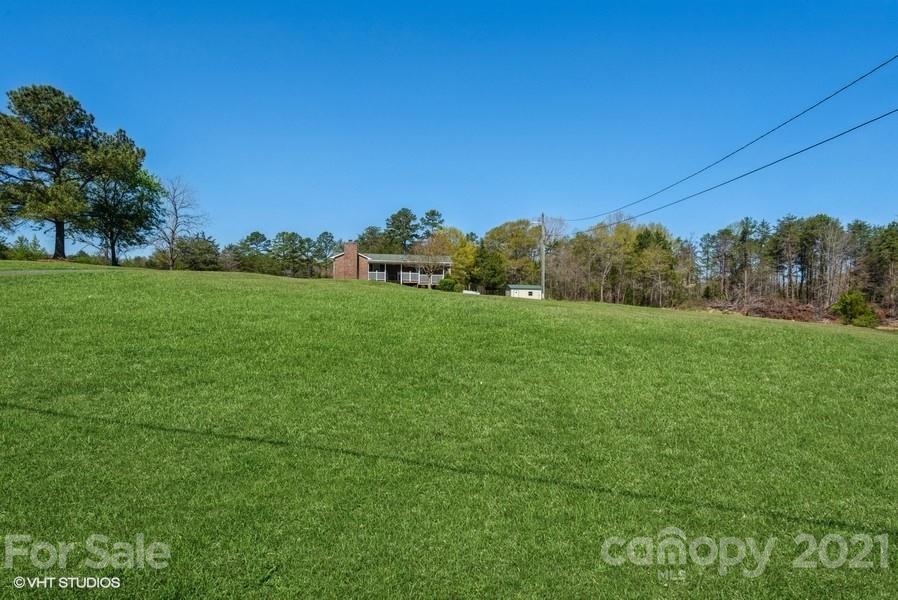 2564 Stroupe Road Clover, SC 29710 - Photo 4 of 29 a view of a field of grass and trees