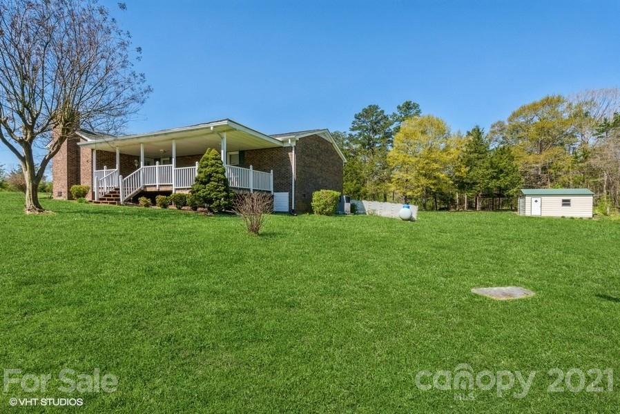 2564 Stroupe Road Clover, SC 29710 - Photo 5 of 29 a front view of a house with garden