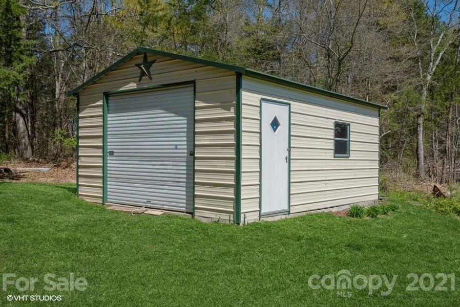 2564 Stroupe Road Clover, SC 29710 - Photo 6 of 29 a front view of a house with a yard