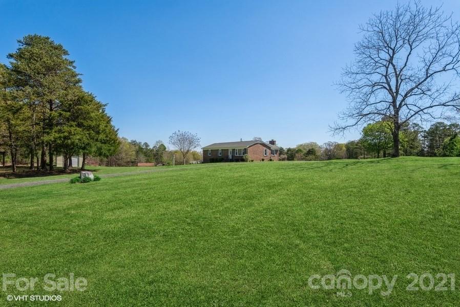 2564 Stroupe Road Clover, SC 29710 - Photo 8 of 29 a view of a garden with trees