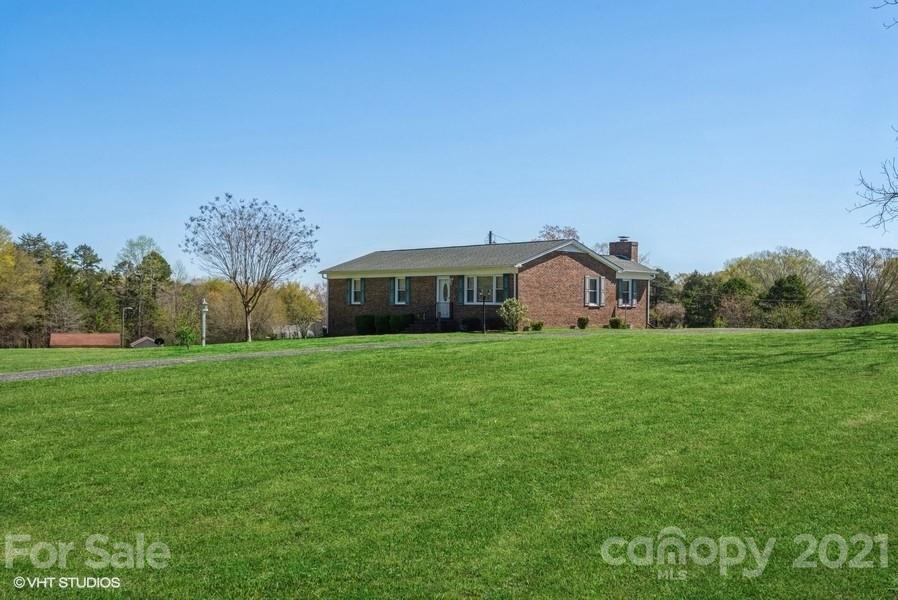2564 Stroupe Road Clover, SC 29710 - Photo 9 of 29 a front view of a house with garden