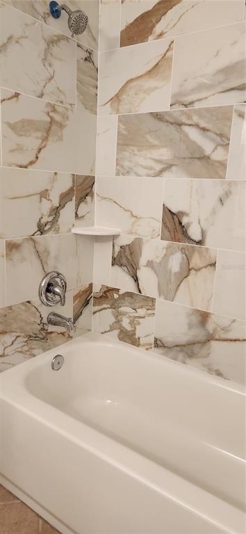 2856 Trenton Lane Deltona, FL 32738 - Photo 12 of 16 a bathroom with a sink and a mirror