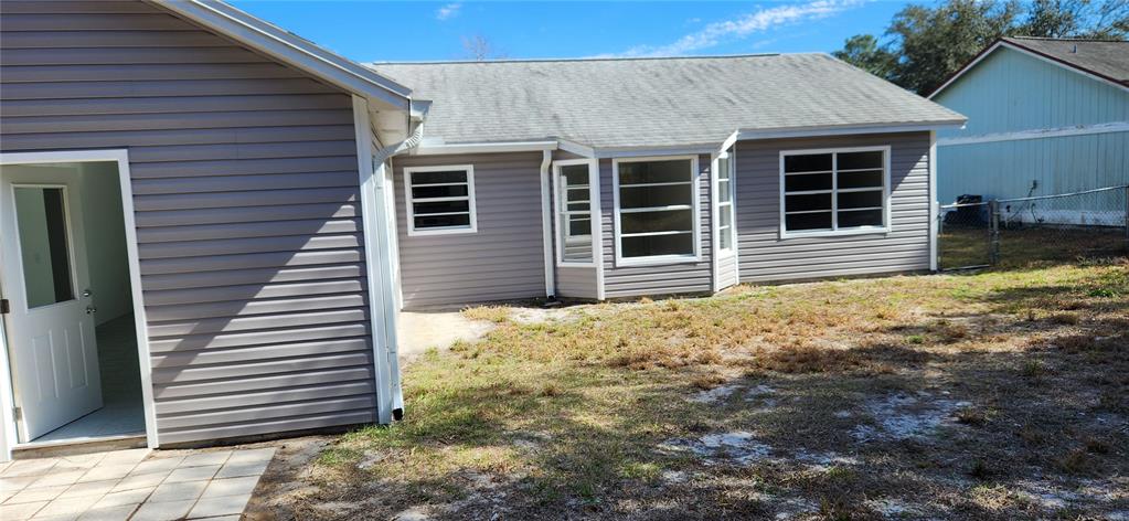 2856 Trenton Lane Deltona, FL 32738 - Photo 15 of 16 a house with a outdoor space