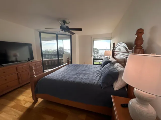 a bed room with a bed and a window