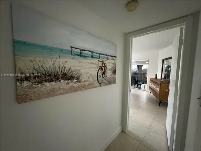 a bedroom with a bed and a chair