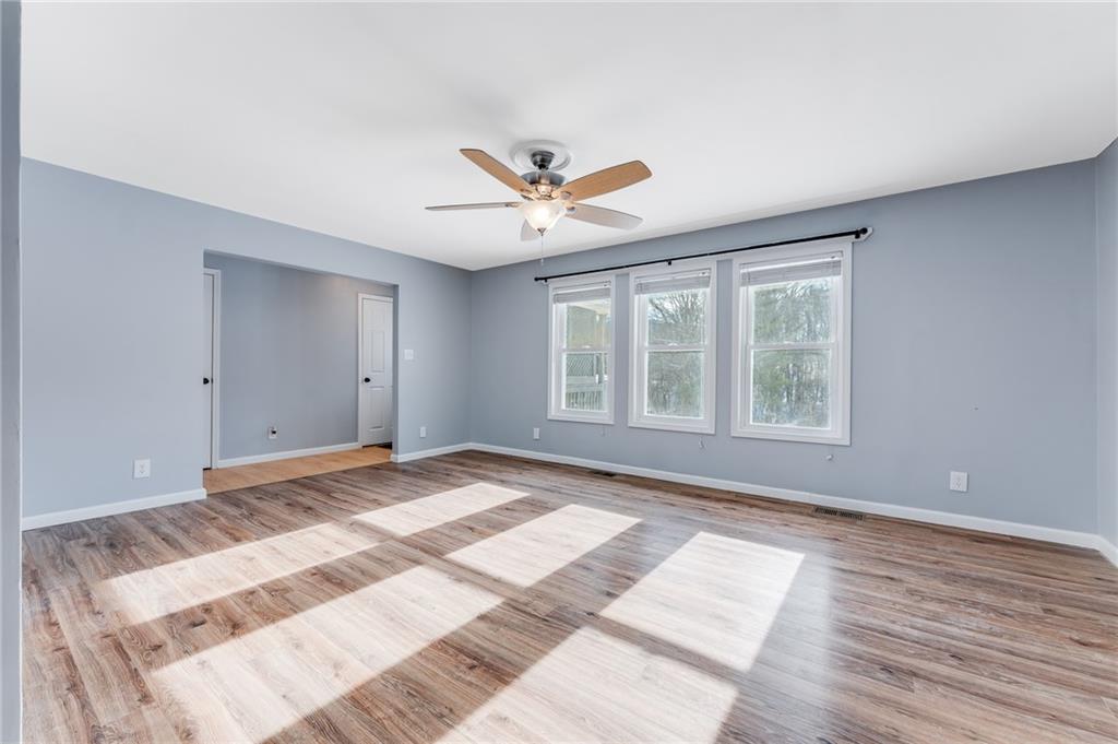 135 Virginia Street Mount Morris, PA 15349 - Photo 36 of 50 a view of a room with a ceiling fan and window