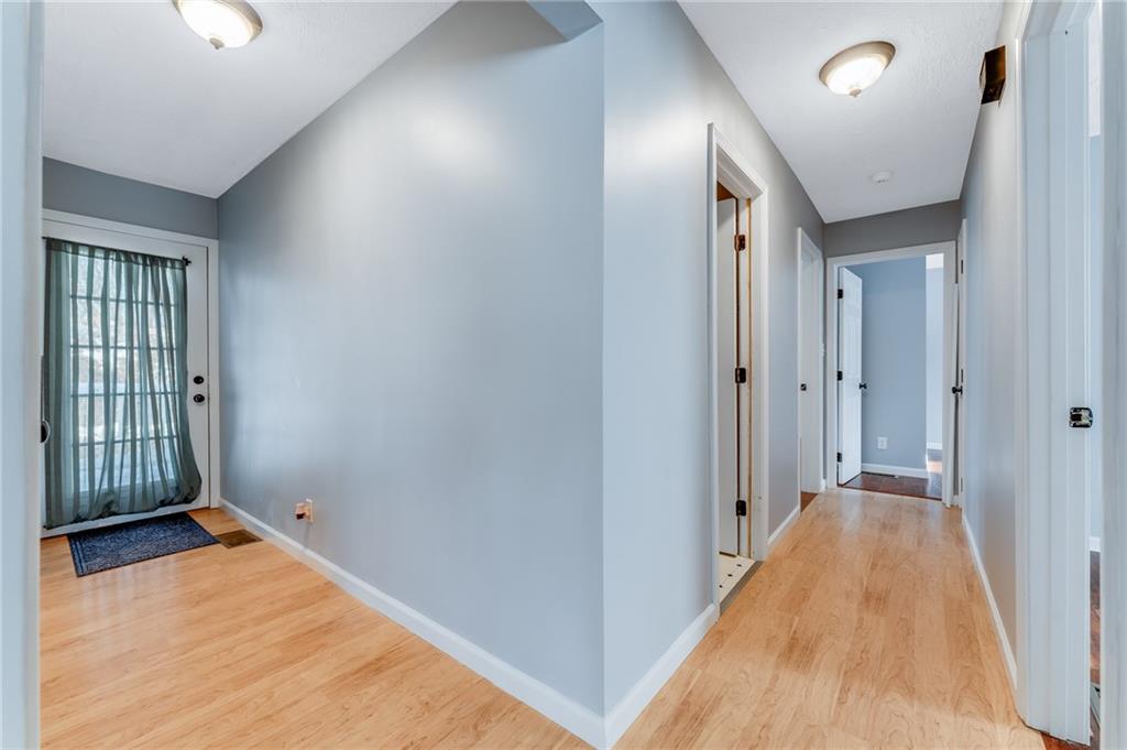 135 Virginia Street Mount Morris, PA 15349 - Photo 46 of 50 wooden floor in a hall with an entryway
