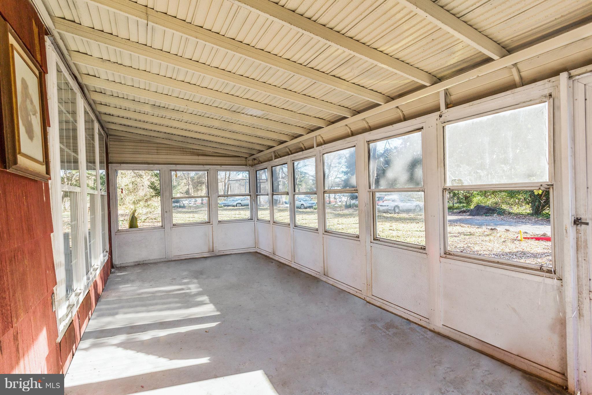 7822 Telegraph Road Severn, MD 21144 - Photo 2 of 12 Enclosed Porch