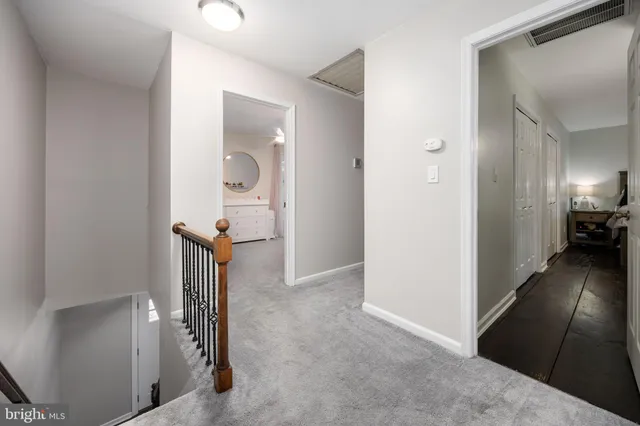 a view of a livingroom from a hallway