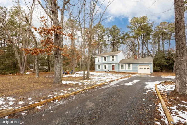 a view of street with parked cars