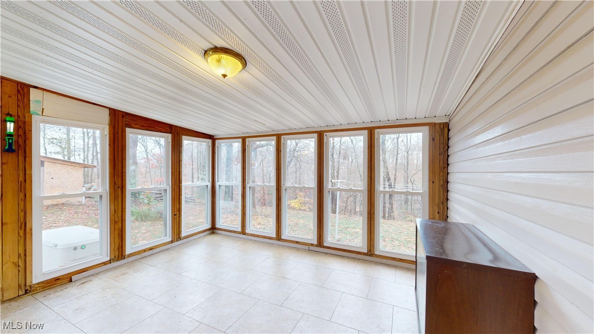 118 Middle Ridge Lane Waverly, WV 26184 - Photo 40 of 48 ALL SEASON SUNROOM THAT WALKS OUT TO THE BACKYARD