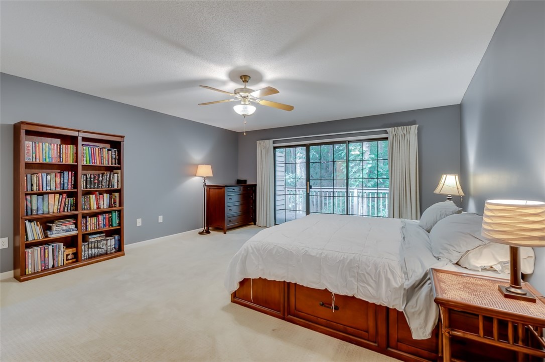 2163 Shea Lane Seneca, SC 29672 - Photo 22 of 31 Master Bedroom with doors leading out to deck.