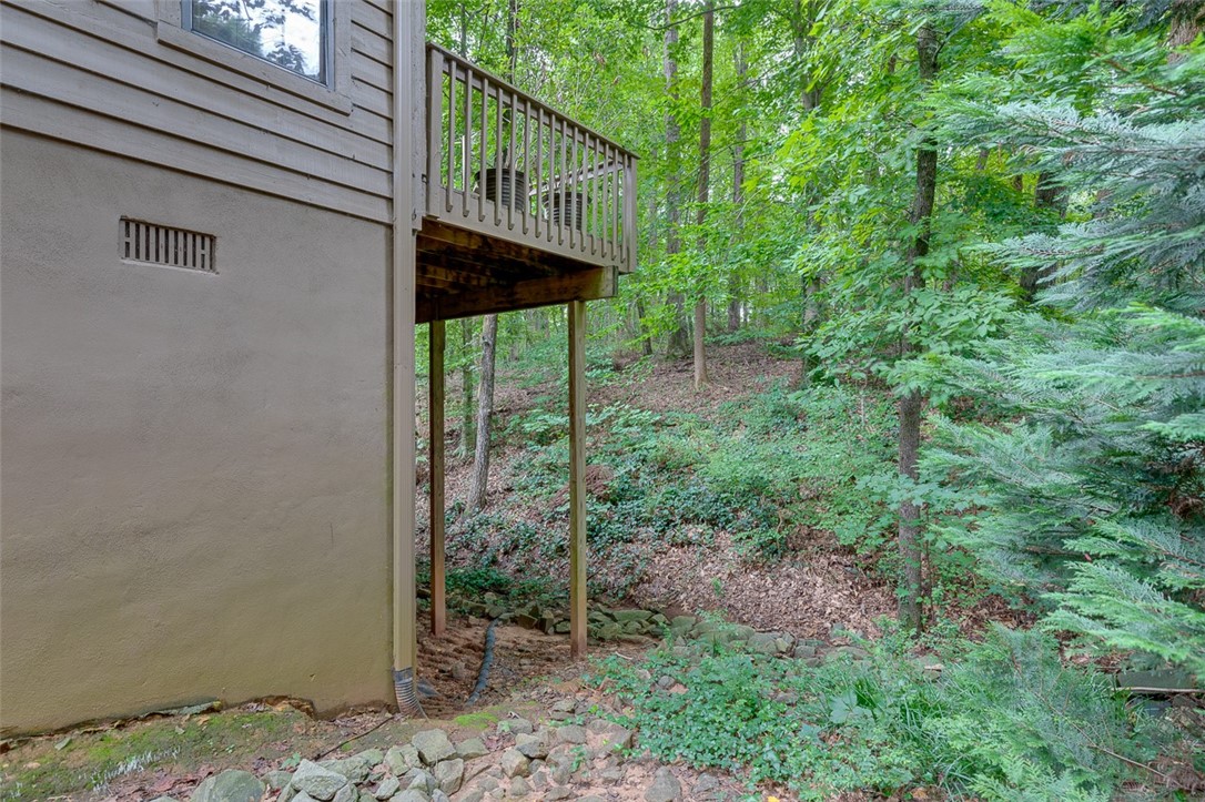 2163 Shea Lane Seneca, SC 29672 - Photo 5 of 31 This end unit offers privacy and natural wood view