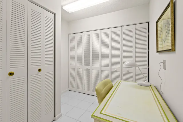 a view of a lake with a city in the background