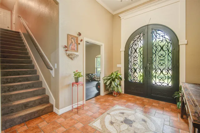 a view of front door with stairs