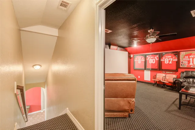 a en suite bathroom with a sink and a mirror