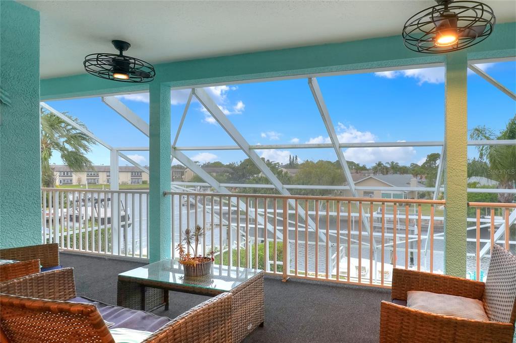 5401 Jobeth Drive New Port Richey, FL 34652 - Photo 20 of 76 Balcony overlooking pool and canal