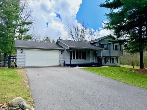 $400,000 | 9811 Pin Oak, Unit 13, Interlochen, MI 49643
