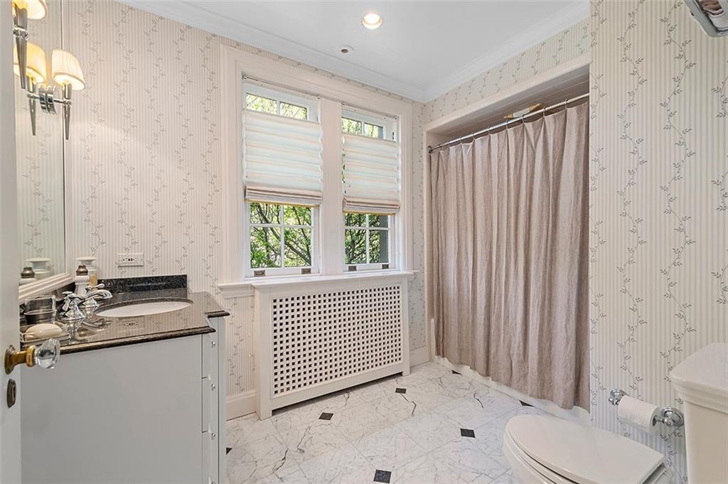 1342 Inverness Avenue Pittsburgh, PA 15217 - Photo 24 of 40 a bathroom with a sink toilet and shower