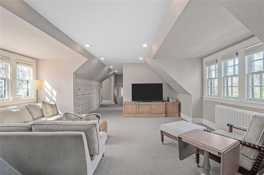 1342 Inverness Avenue Pittsburgh, PA 15217 - Photo 27 of 40 a living room with furniture and a flat screen tv