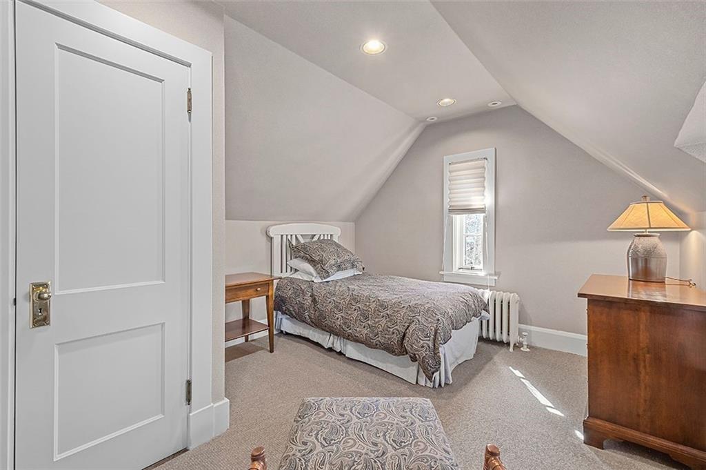 1342 Inverness Avenue Pittsburgh, PA 15217 - Photo 28 of 40 a bedroom with a bed a lamp and window