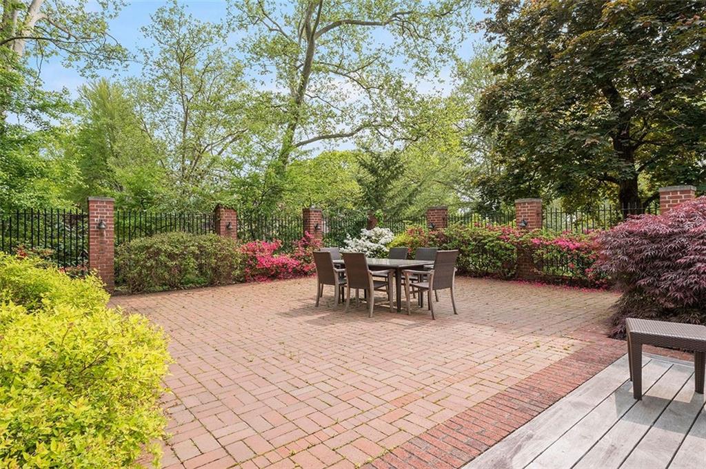 1342 Inverness Avenue Pittsburgh, PA 15217 - Photo 39 of 40 a bench is sitting in the middle of a patio