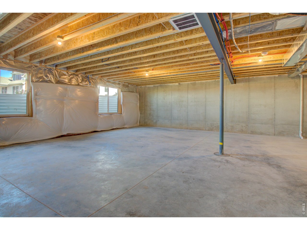 5705 2nd Road Greeley, CO 80634 - Photo 38 of 46 9' basement ceilings, on-demand H20 heater, passive radon mitigation, 96% efficiency direct-vent furnace with a fresh air ventilator