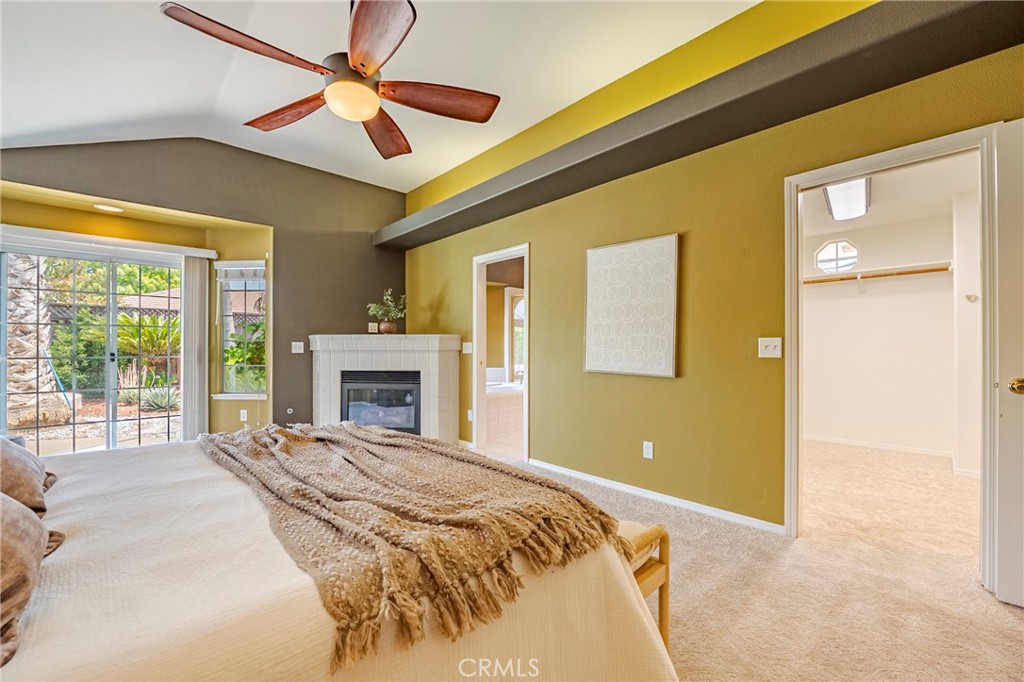 625 Redwing Drive Merced, CA 95340 - Photo 37 of 57 a bed room with a bed and a ceiling fan