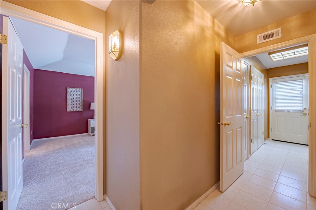 625 Redwing Drive Merced, CA 95340 - Photo 45 of 57 a view of a hallway with wooden cabinets