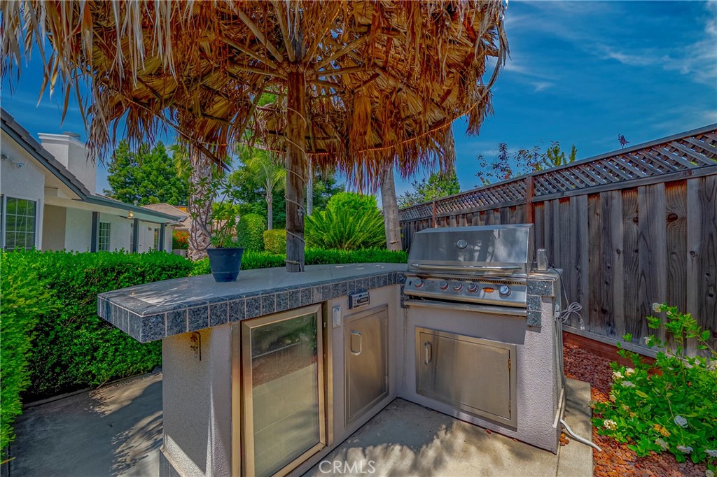 625 Redwing Drive Merced, CA 95340 - Photo 52 of 57 a view of a kitchen with a sink and a yard