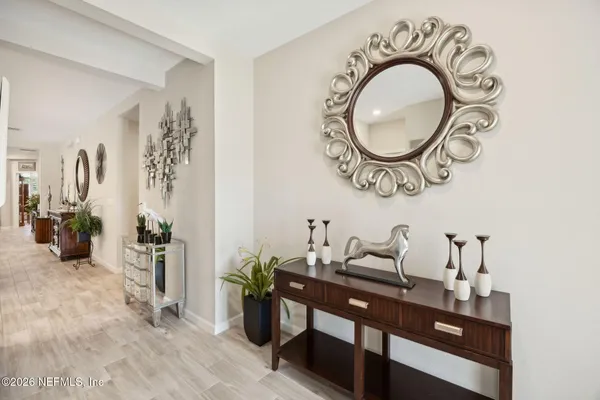 a view of a hallway with entryway