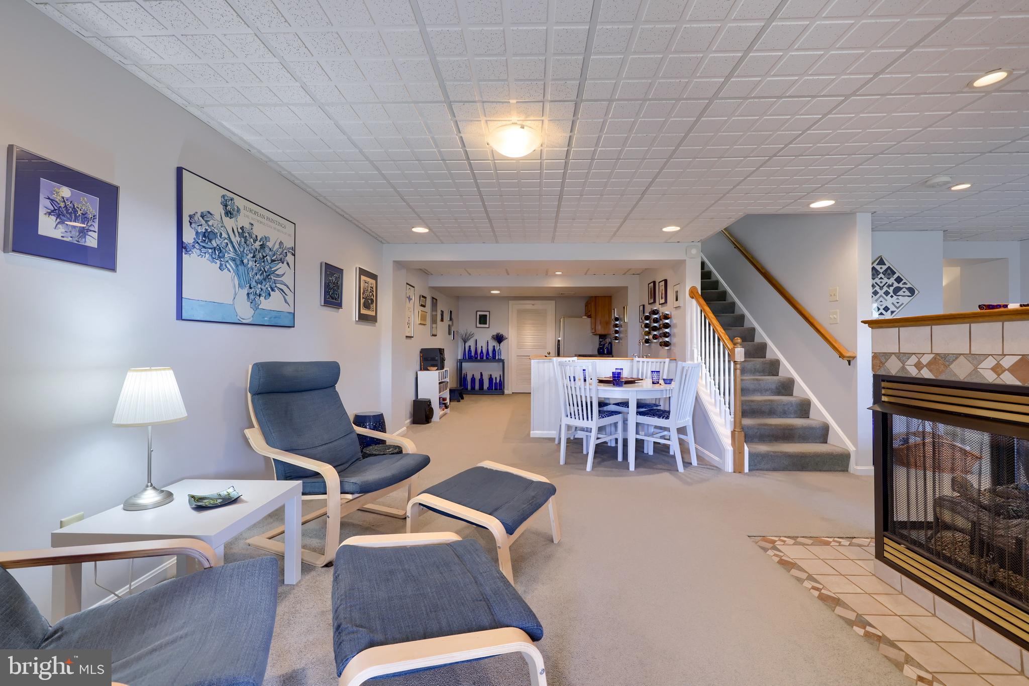728 Skywalk Lane Lancaster, PA 17601 - Photo 13 of 39 a living room with furniture a wooden floor and a piano