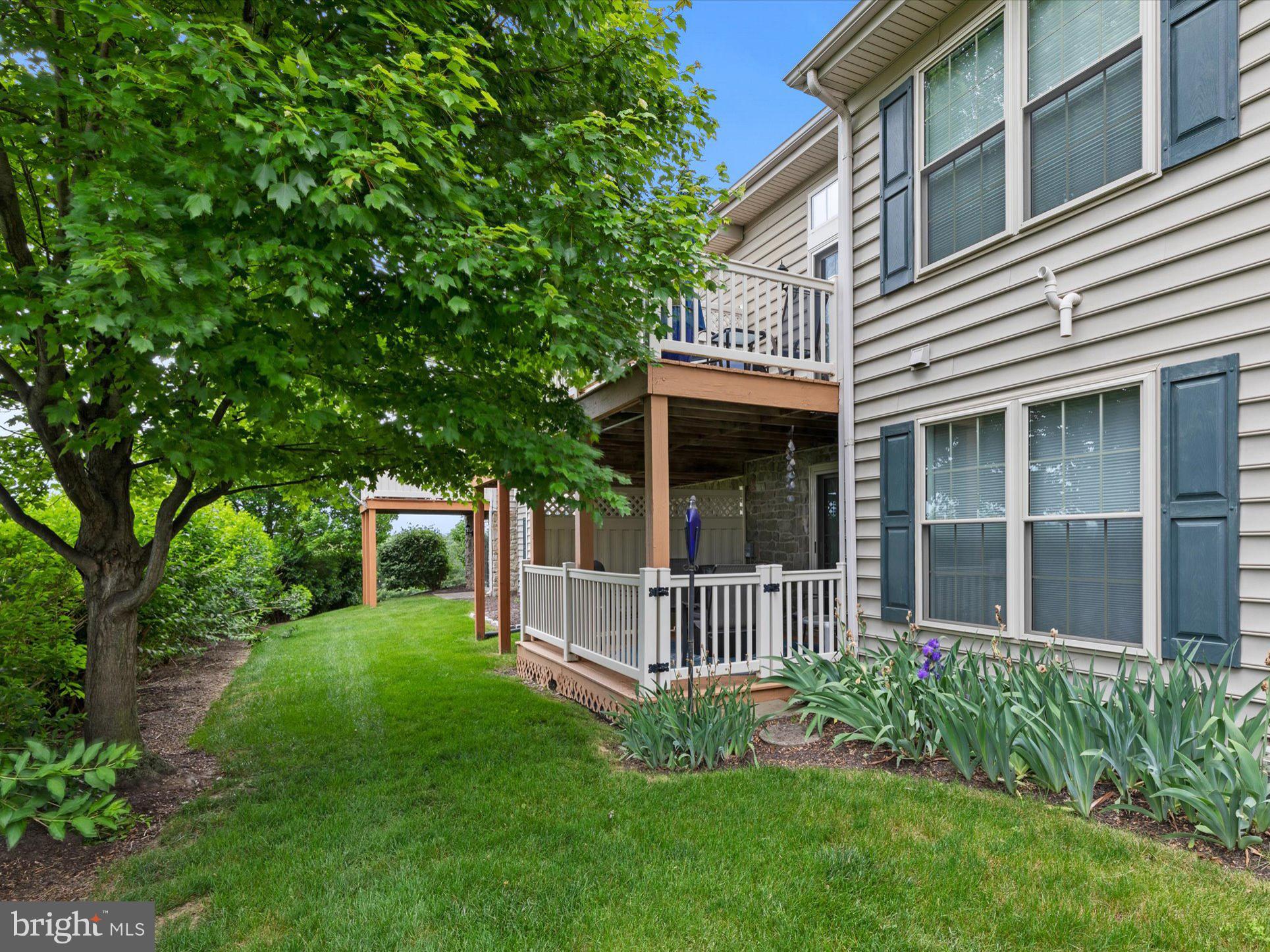 728 Skywalk Lane Lancaster, PA 17601 - Photo 38 of 39 a view of a house with a yard and garden
