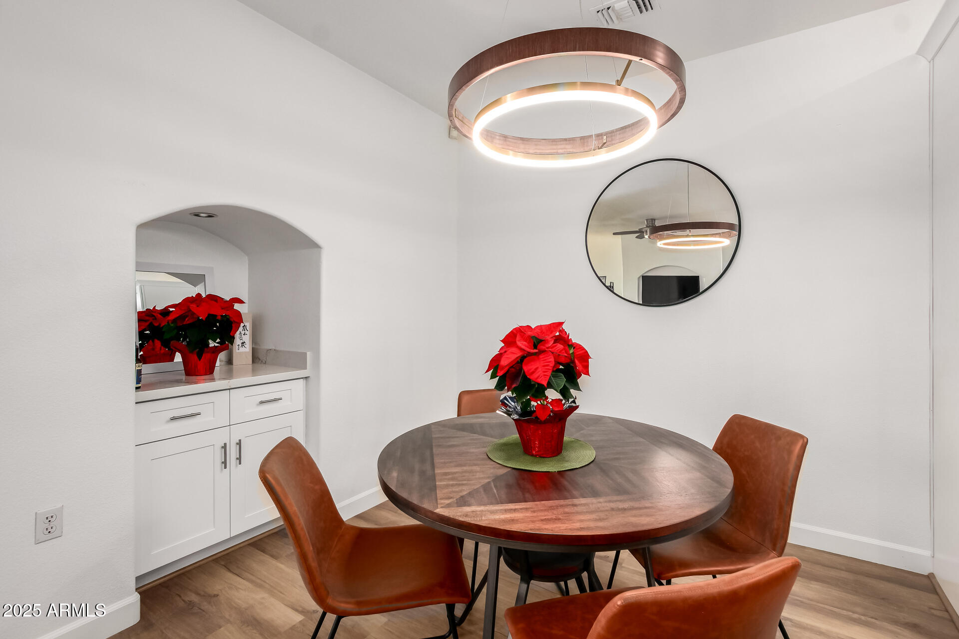 3221 North 37th Street, Unit 4 Phoenix, AZ 85018 - Photo 11 of 40 a dining room with furniture and wooden floor