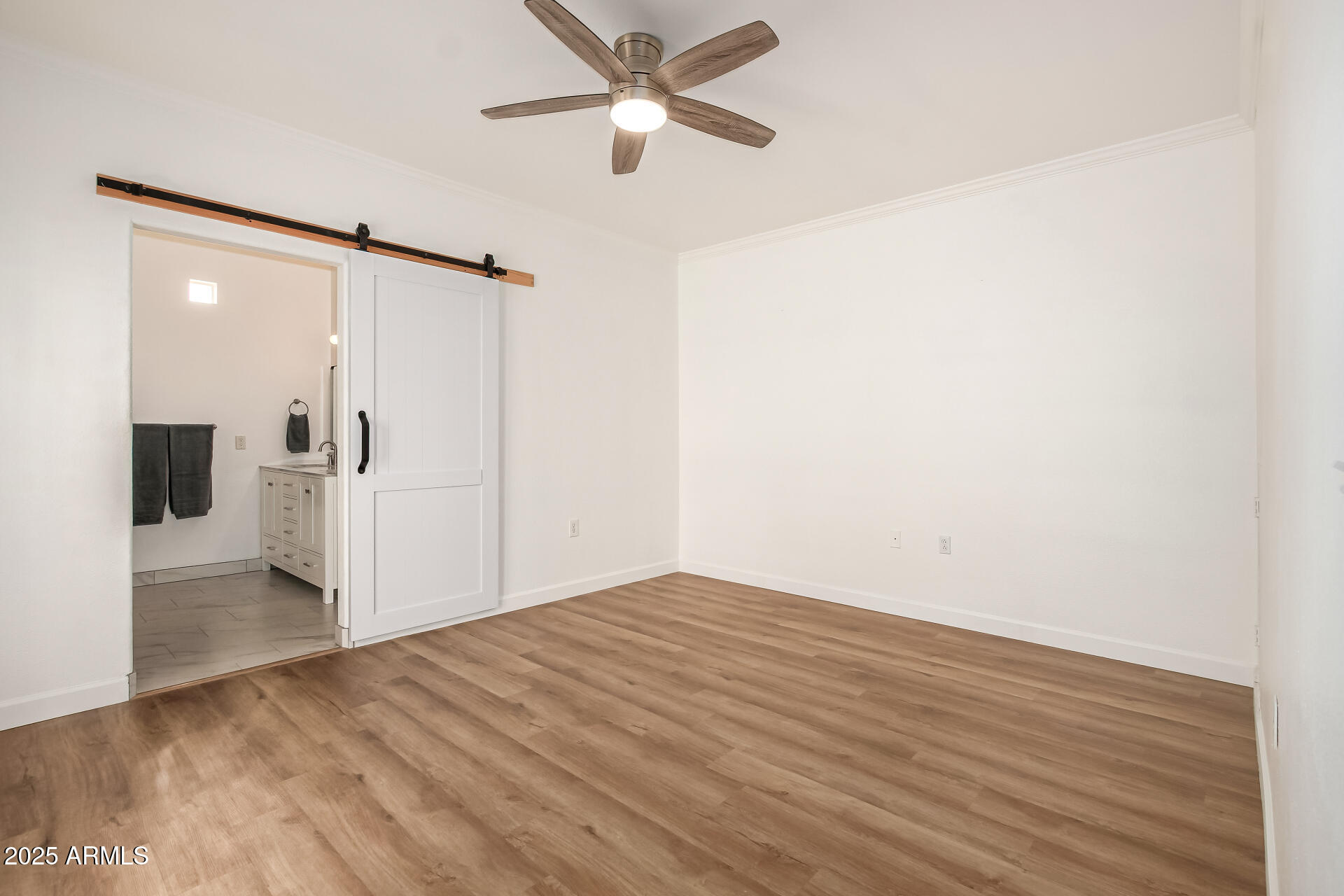3221 North 37th Street, Unit 4 Phoenix, AZ 85018 - Photo 17 of 40 a view of empty room with wooden floor