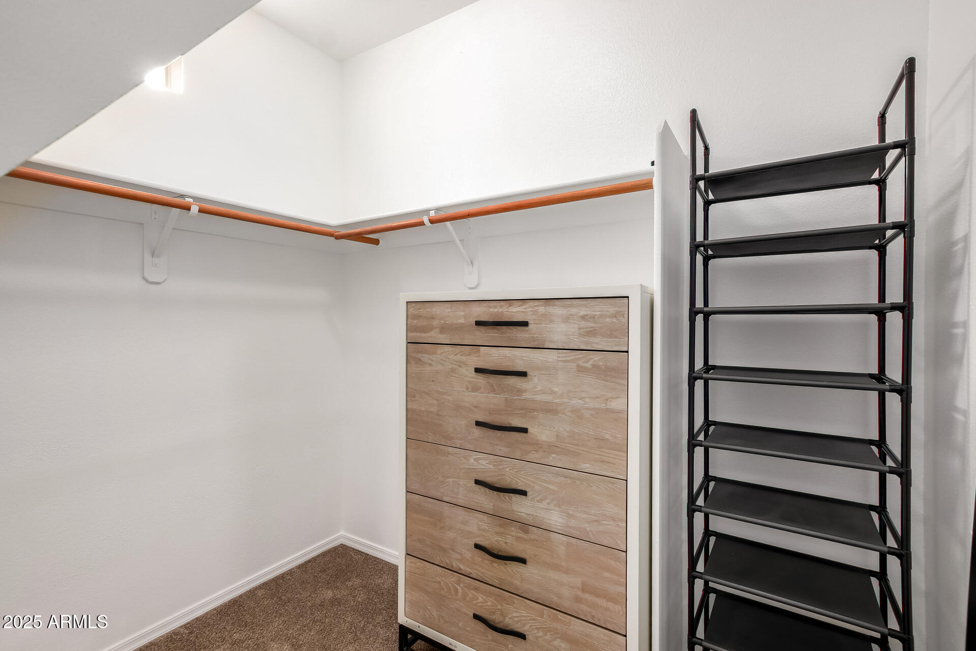 3221 North 37th Street, Unit 4 Phoenix, AZ 85018 - Photo 25 of 40 a view of walk in closet with empty racks