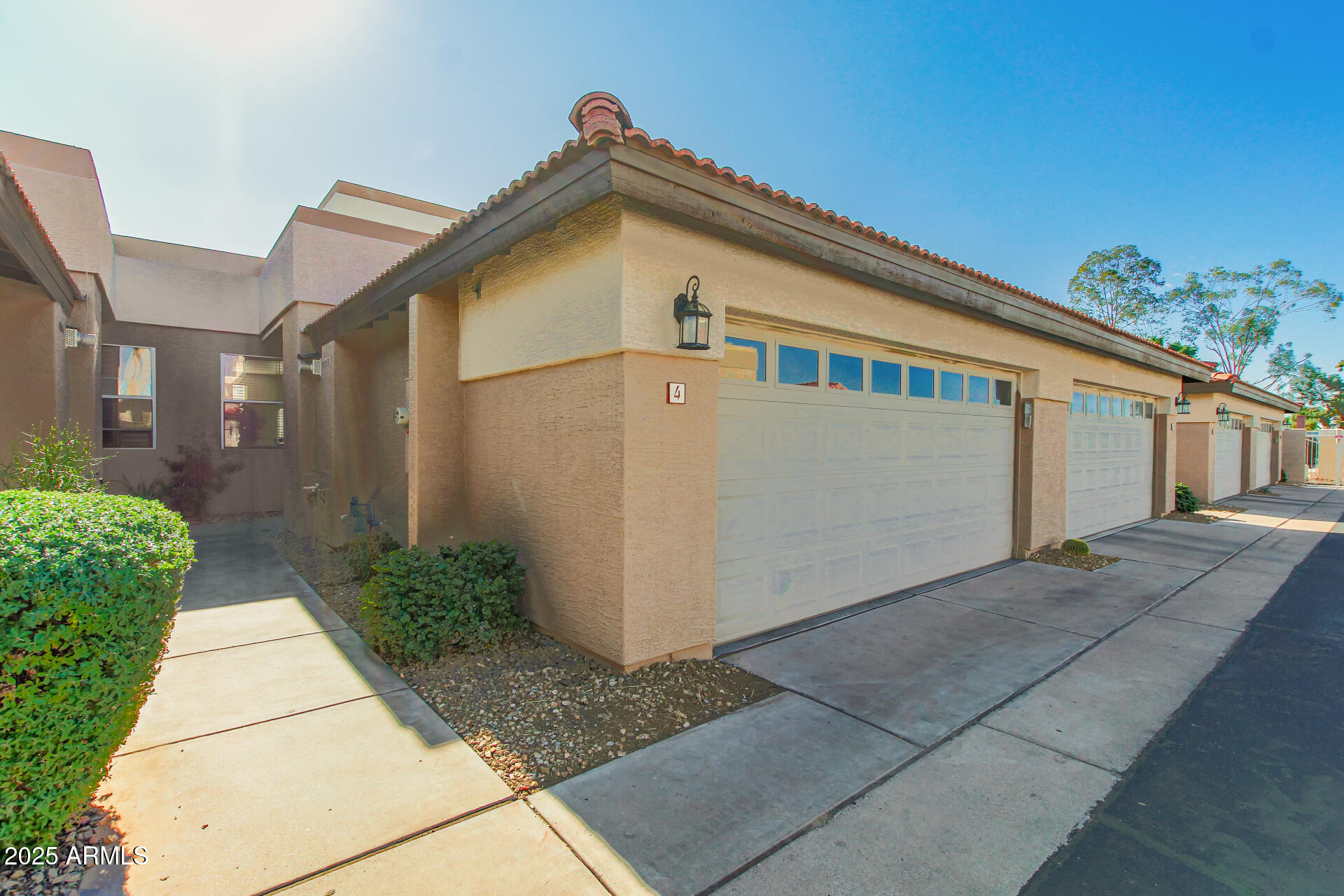 3221 North 37th Street, Unit 4 Phoenix, AZ 85018 - Photo 3 of 40 a front view of a house with garden