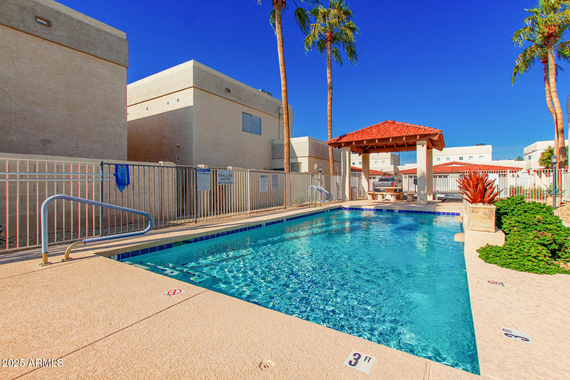 3221 North 37th Street, Unit 4 Phoenix, AZ 85018 - Photo 37 of 40 a view of a house with a yard