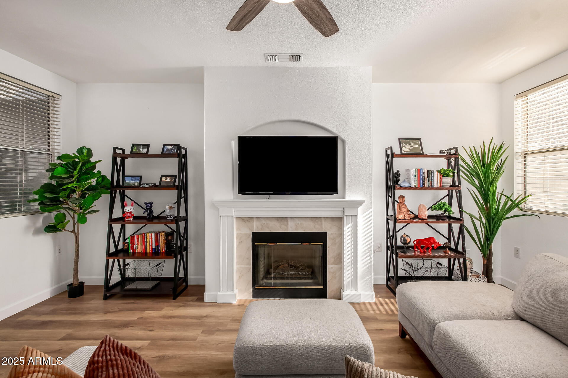 3221 North 37th Street, Unit 4 Phoenix, AZ 85018 - Photo 9 of 40 a living room with furniture fireplace and flower pot