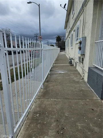 a view of a porch with wooden floor