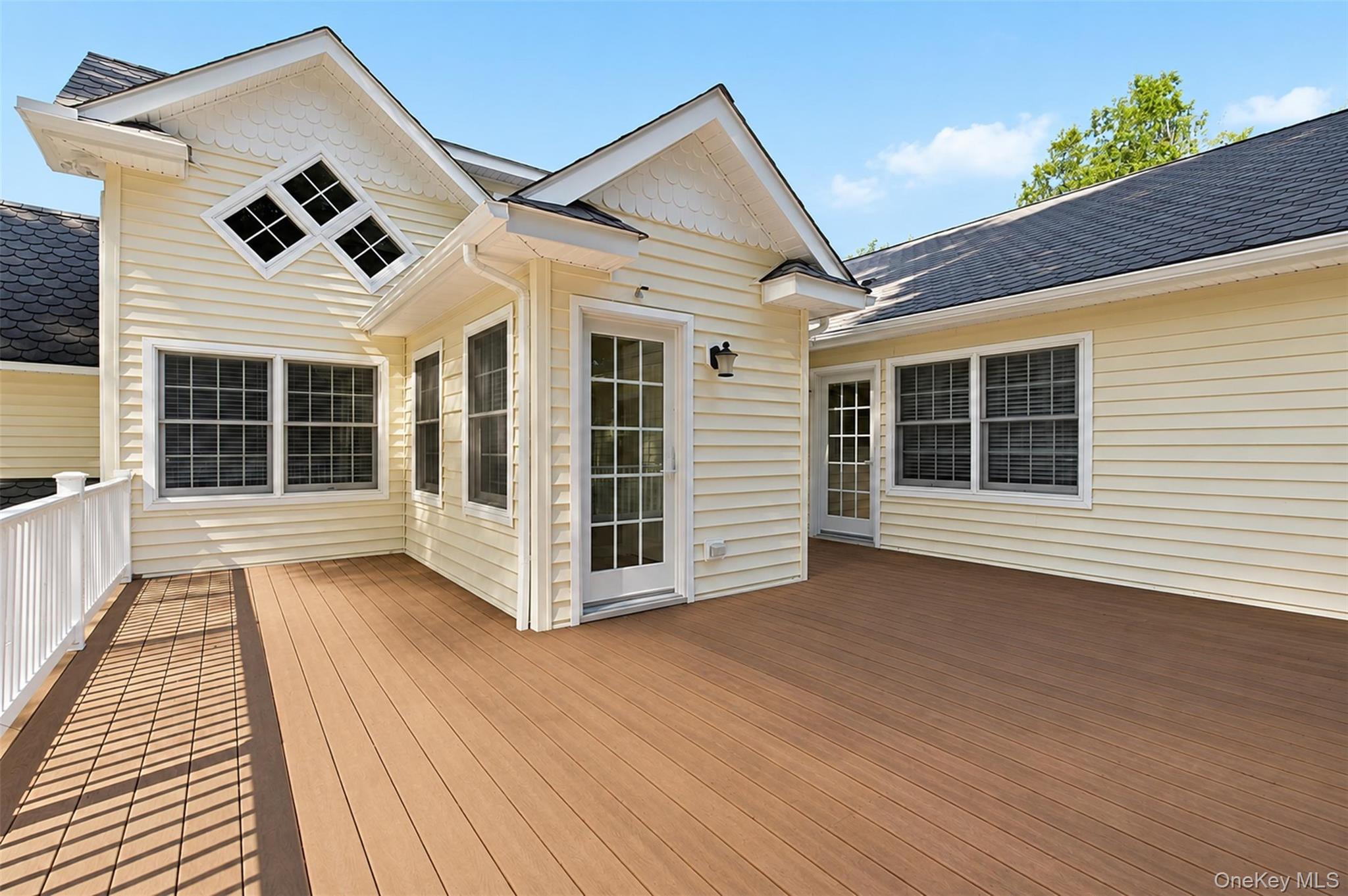 12 Leeside Road Carmel, NY 10512 - Photo 33 of 44 Expansive outdoor deck featuring wood-finish flooring and white railing
