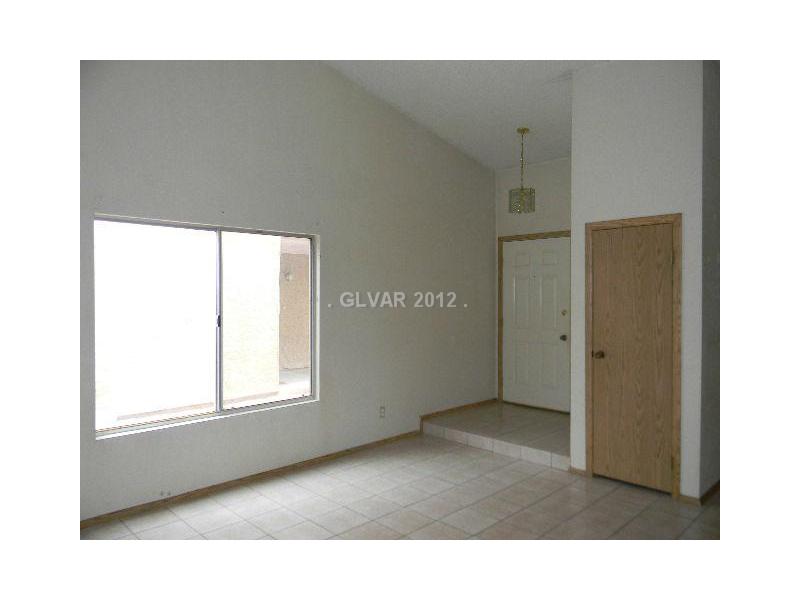 504 Inness Avenue Henderson, NV 89011 - Photo 4 of 29 Living Room. LIVING ROOM HAS VAULTED CEILING