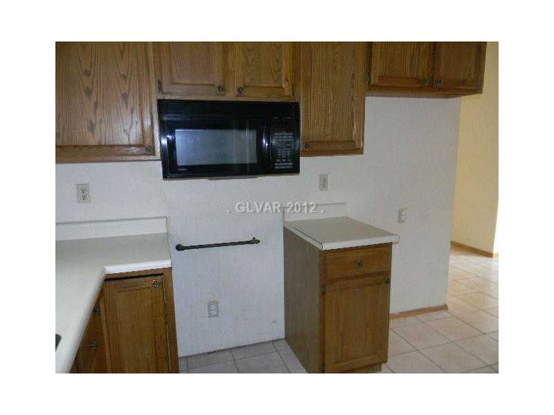 504 Inness Avenue Henderson, NV 89011 - Photo 6 of 29 Kitchen. BUILT IN MICROWAVE IN THE KITCHEN
