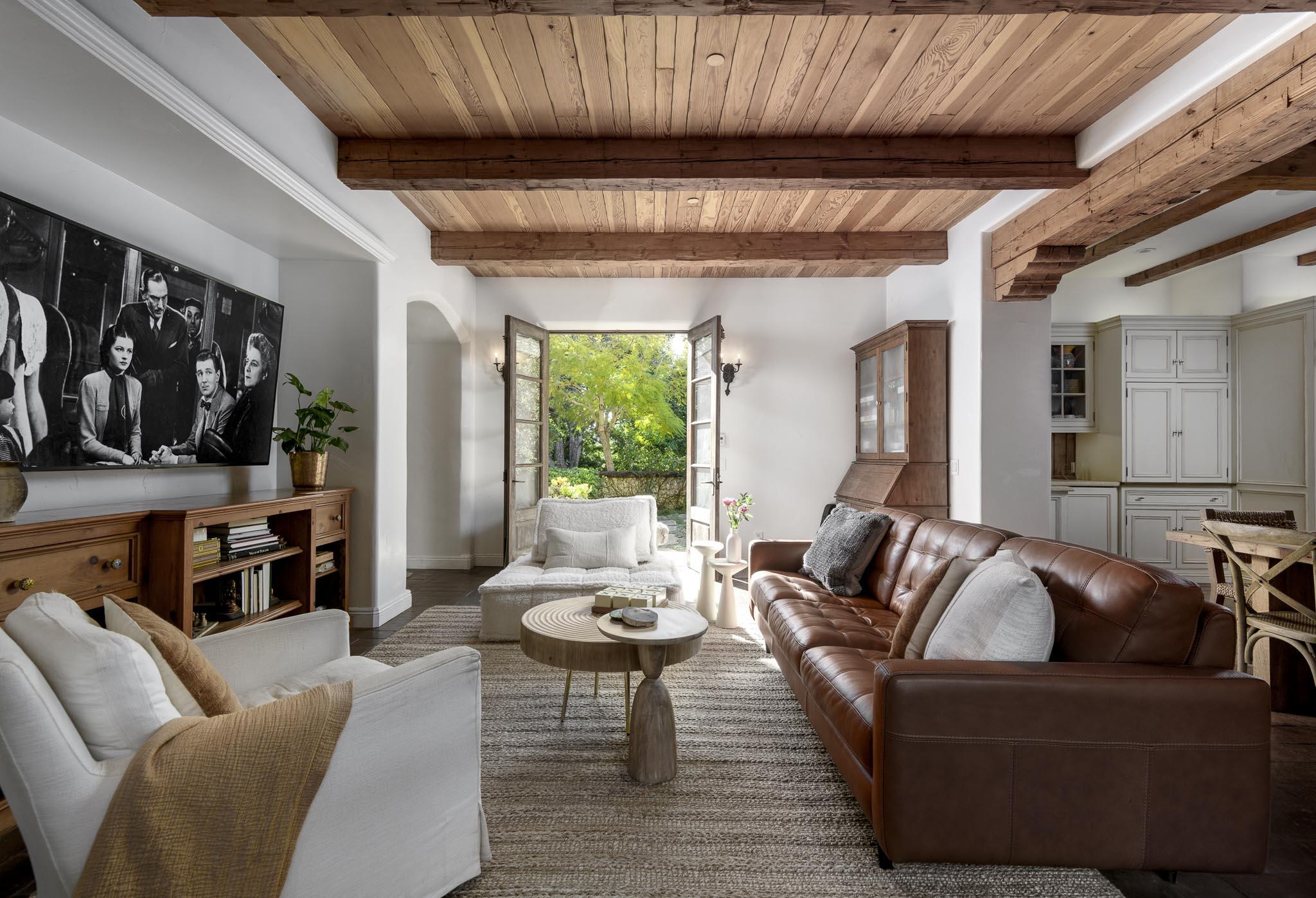 2222 East Valley Road Montecito, CA 93108 - Photo 11 of 30 a living room with furniture a ceiling fan and a window